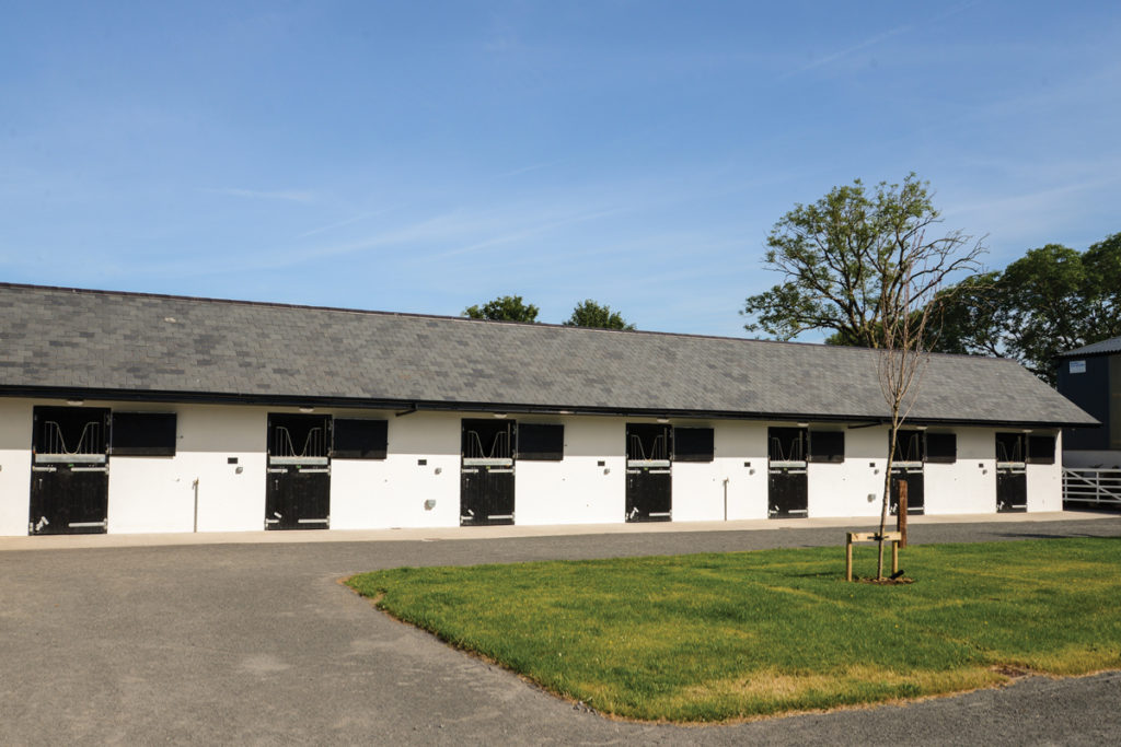 Stable block with black stable doors